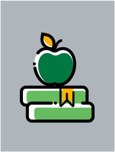 A green apple sitting on top of two books